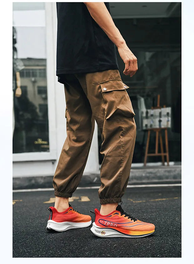Tênis de corrida masculino de verão novo profissional placa de carbono sapatos de treinamento esportivo ao ar livre antiderrapante absorção de choque tênis
